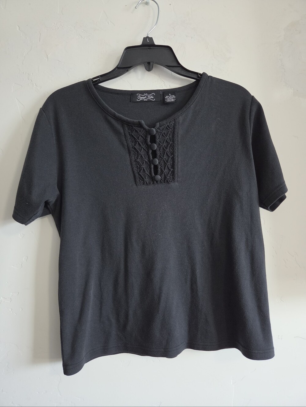 Crystal Kobe Black Short-Sleeve Knit Top with Decorative Buttons